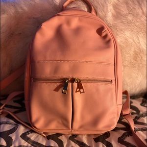 Light pink book bag ( no name brand )